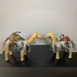 Vintage Lot of two hand stitched leather camels with fringe Rare